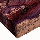 Close-up of a stretched canvas artwork showcasing a vibrant landscape design with intricate rock formations, ideal for modern home decor and wall art collection.