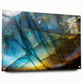 Acrylic glass wall art featuring a vibrant landscape design showcasing colorful rocks and natural textures, displayed from a side view with decorative pins.