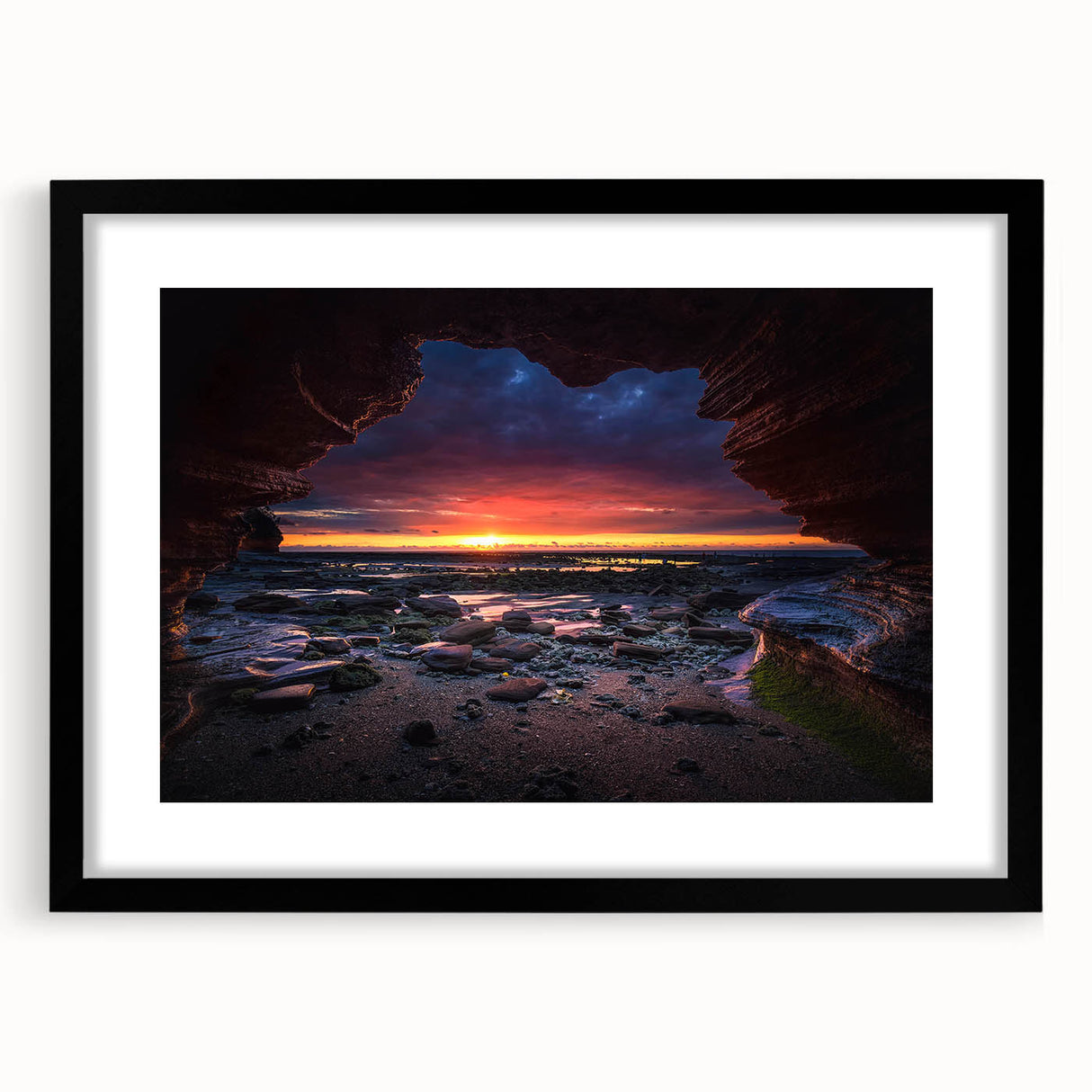 Framed black wall art design showcasing a serene landscape with rocks, featuring a matte finish and contemporary style, perfect for modern home decor.