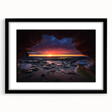 Framed black wall art design showcasing a serene landscape with rocks, featuring a matte finish and contemporary style, perfect for modern home decor.