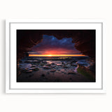 Framed wall art showcasing a serene landscape with rocks, set in a white mat for an elegant finish, perfect for enhancing home decor aesthetics.