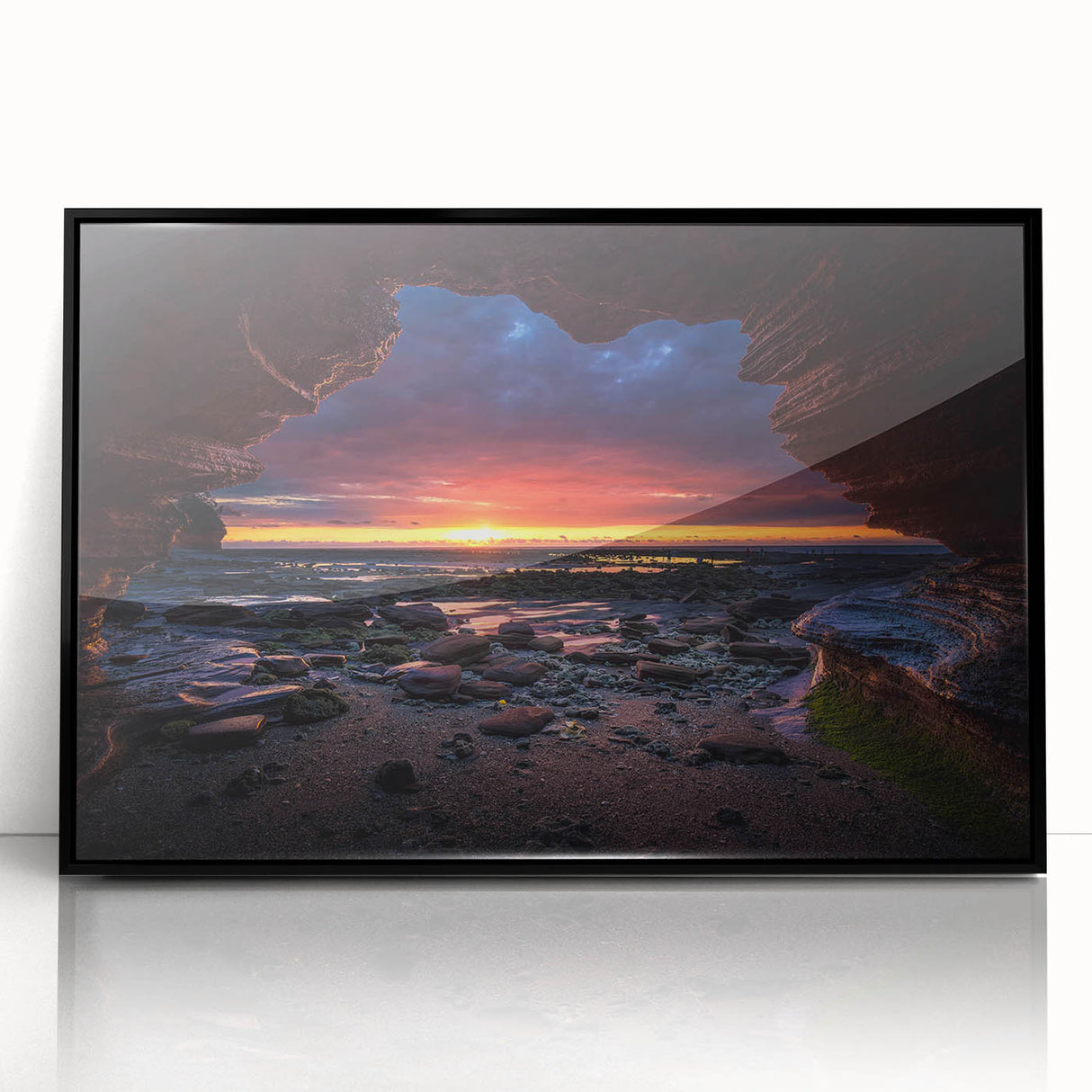 Framed acrylic wall art featuring a stunning landscape design with rocky terrain, presented in a sleek black frame, perfect for modern home decor.