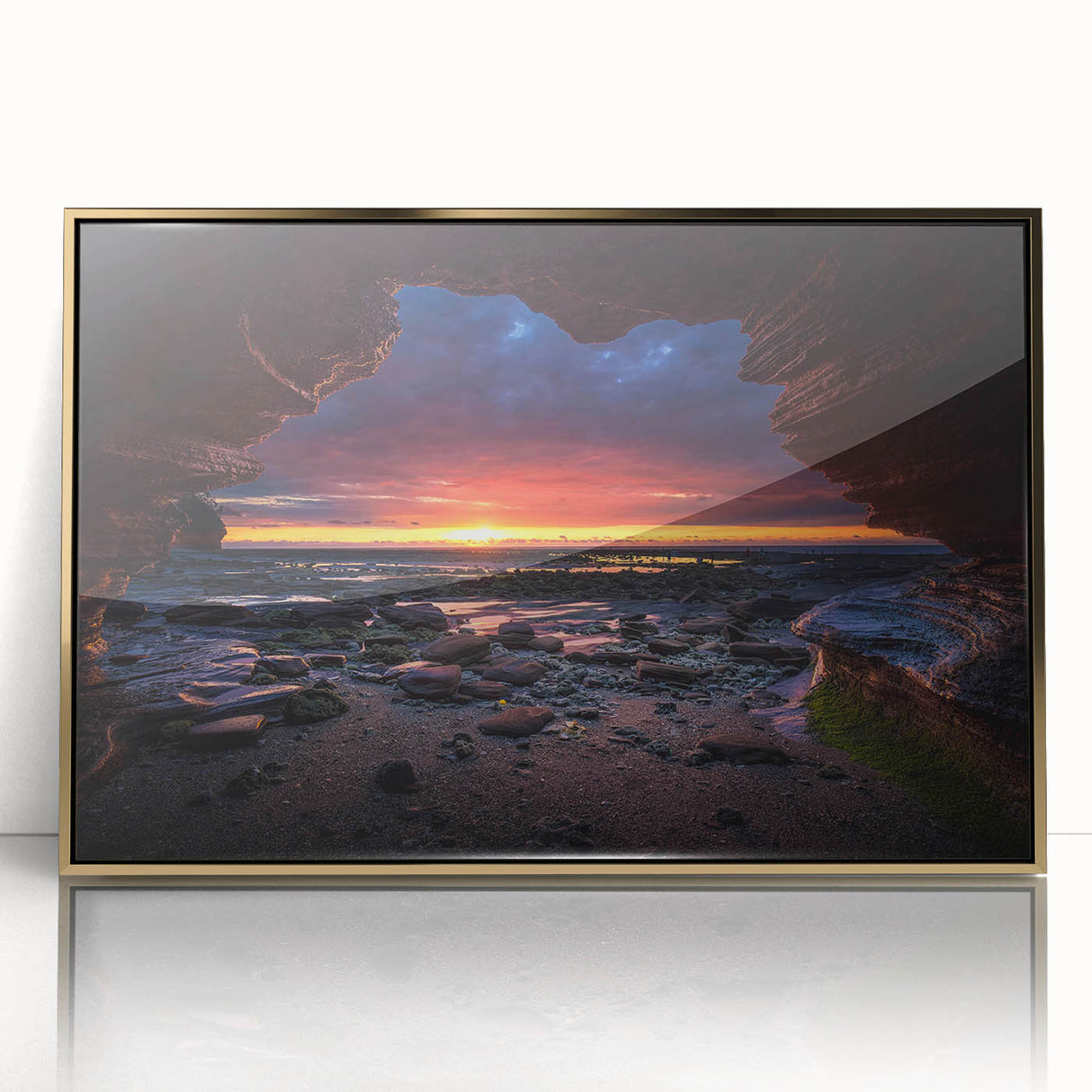 Framed wall art showcasing a stunning landscape design with vibrant rock formations and a sleek gold frame, perfect for modern home decor and aesthetics.
