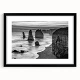Framed wall art collection showcasing a serene seascape design, featuring calming blue and white hues, with a sleek black frame and mat, perfect for coastal decor.