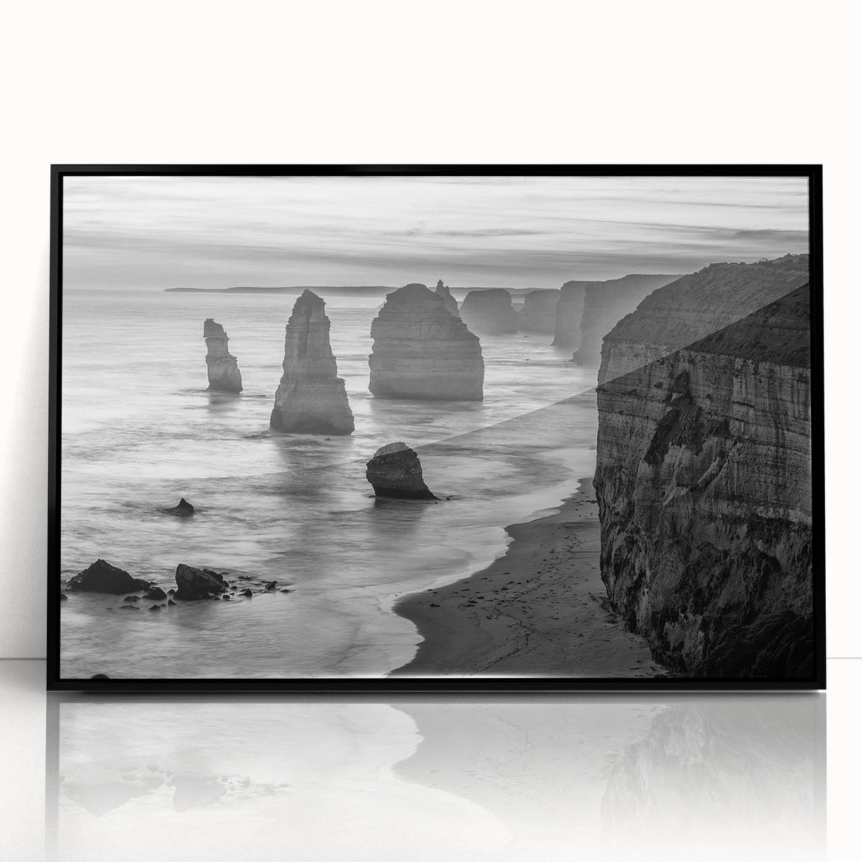Framed acrylic wall art featuring a serene seascape design, showcasing vibrant blue and green hues with a sleek black frame, perfect for modern home decor.