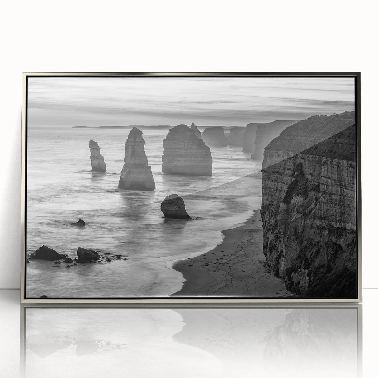 Framed acrylic wall art featuring a serene seascape design with soft blue and silver tones, ideal for modern home decor. Perfect for adding a tranquil touch to any room.