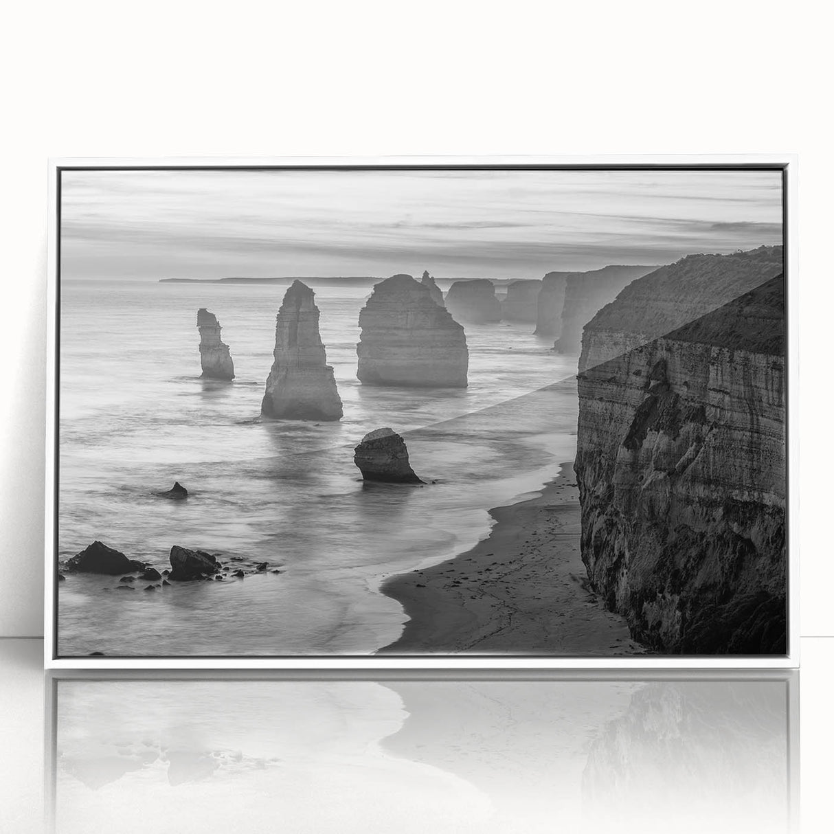 Framed acrylic wall art featuring a serene seascape design with calming blue and white tones, showcased from a front view against a minimalist background. Ideal for coastal-themed decor.