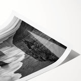 Rolled print of a serene seascape design, featuring soft blues and greens, elegantly packaged in a protective cardboard tube for easy transport and display.