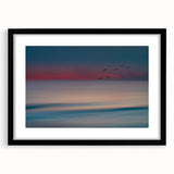 Framed black wall art featuring a serene seascape design with a white mat, perfect for enhancing modern home decor and creating a calming atmosphere.