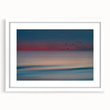 Elegant wall art collection showcasing a serene seascape design framed with a white mat, perfect for coastal-themed decor or modern interiors.