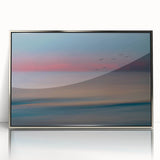Framed acrylic wall art collection featuring serene seascapes and landscapes in silver frames, ideal for modern home decor, showcasing calming oceanic hues and natural scenery.