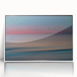 Framed acrylic wall art featuring a serene seascape design with calming blue hues, displayed in a sleek white frame, ideal for home decor enhancement.