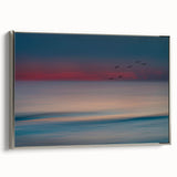 Framed canvas wall art showcasing a serene seascape design with silver accents, ideal for enhancing modern home decor. Perfect for coastal-themed interiors.