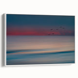 Framed wall art collection featuring a serene seascape in soft blue and white tones, presented with a sleek white frame, ideal for coastal-themed decor.