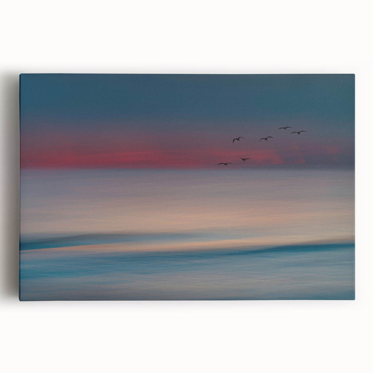 Stretched canvas wall art showcasing a vibrant seascape design with rich blues and greens, perfect for enhancing coastal-themed interiors.