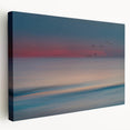 Stretched canvas wall art showcasing a vibrant seascape design, featuring rich blues and greens, ideal for enhancing coastal-themed interiors. Perfect for adding a serene ambiance to living spaces.