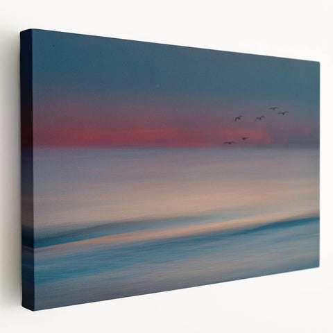 Stretched canvas wall art showcasing a vibrant seascape design, featuring rich blues and greens, ideal for enhancing coastal-themed interiors. Perfect for adding a serene ambiance to living spaces.