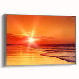 Framed canvas wall art showcasing a serene seascape design with vibrant blues and soft whites, highlighted by a sleek silver frame, ideal for modern home decor.