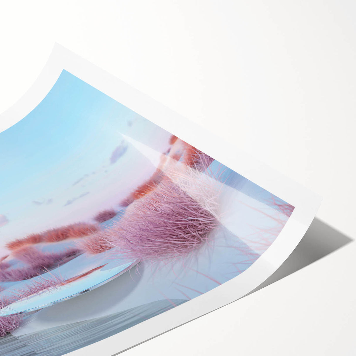 Rolled print of a serene seascape landscape featuring vibrant blues and soft whites, designed for wall art display, elegantly packaged in a protective tube.