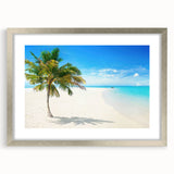 Framed wall art from the Landscapes & Seascapes collection, featuring a serene ocean view with gentle waves, set in a sleek silver frame with a white mat. Ideal for enhancing home décor with coastal elegance.