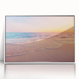 Framed acrylic wall art featuring a serene seascape design with soft blue and white hues, elegantly displayed against a white background, ideal for home decor.