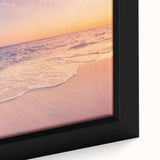 Framed canvas wall art showcasing a vibrant seascape design with rich blues and greens, perfect for coastal-themed decor. Ideal for enhancing living spaces with artistic flair.