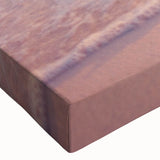 Close-up of a stretched canvas artwork showcasing vibrant seascape and landscape designs, featuring rich colors and intricate details, perfect for home decor.