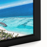 Close-up of a framed canvas from the Landscapes & Seascapes collection, showcasing vibrant ocean waves in rich blues and greens, perfect for coastal décor.