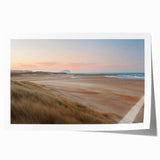 Rolled print showcasing a serene seascape design with vibrant blues and soft clouds, ideal for coastal-themed decor, packaged securely in a cardboard tube.