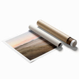 Rolled print of serene seascape artwork showcasing vibrant blues and calming waves, perfect for coastal-themed decor. Packaged securely in a cardboard tube.