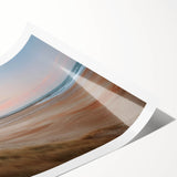 Rolled print showcasing a serene seascape design with calming blue and green hues, elegantly packaged in a durable cardboard tube, ideal for home decor.