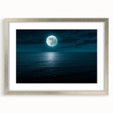Framed wall art showcasing a serene seascape design with a silver mat, perfect for home decor. The artwork features calming ocean hues, enhancing any space.