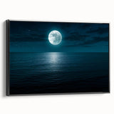 Framed canvas wall art showcasing a vibrant seascape design, featuring blues and greens of the ocean, with a sleek black frame enhancing its elegance. Perfect for coastal-themed decor.
