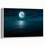 Framed canvas wall art featuring a serene seascape design with soft blues and whites, displayed in a sleek white frame, ideal for coastal-themed decor.