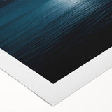 Rolled canvas artwork showcasing a vibrant seascape design with dynamic waves and a serene sunset, packaged securely in a protective cardboard tube for shipping.