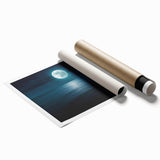 Rolled print of a serene coastal landscape featuring vibrant blue ocean waves and a sunset sky, elegantly designed for wall art display, packaged securely.