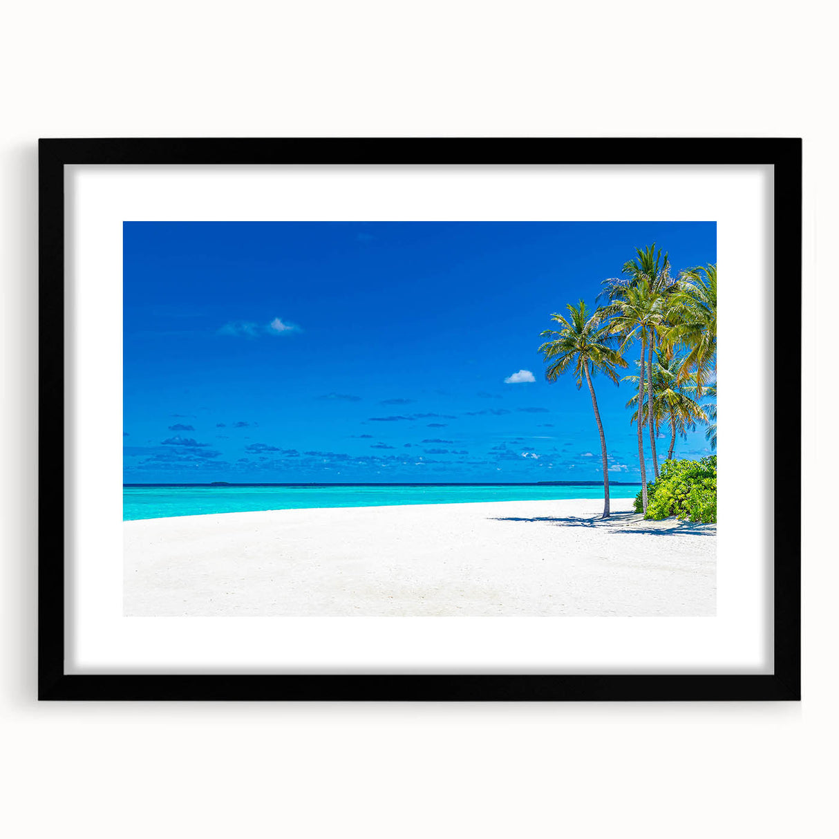 Framed wall art collection showcasing a serene seascape design with a black mat and frame, perfect for modern home decor. Ideal for coastal-themed interiors.