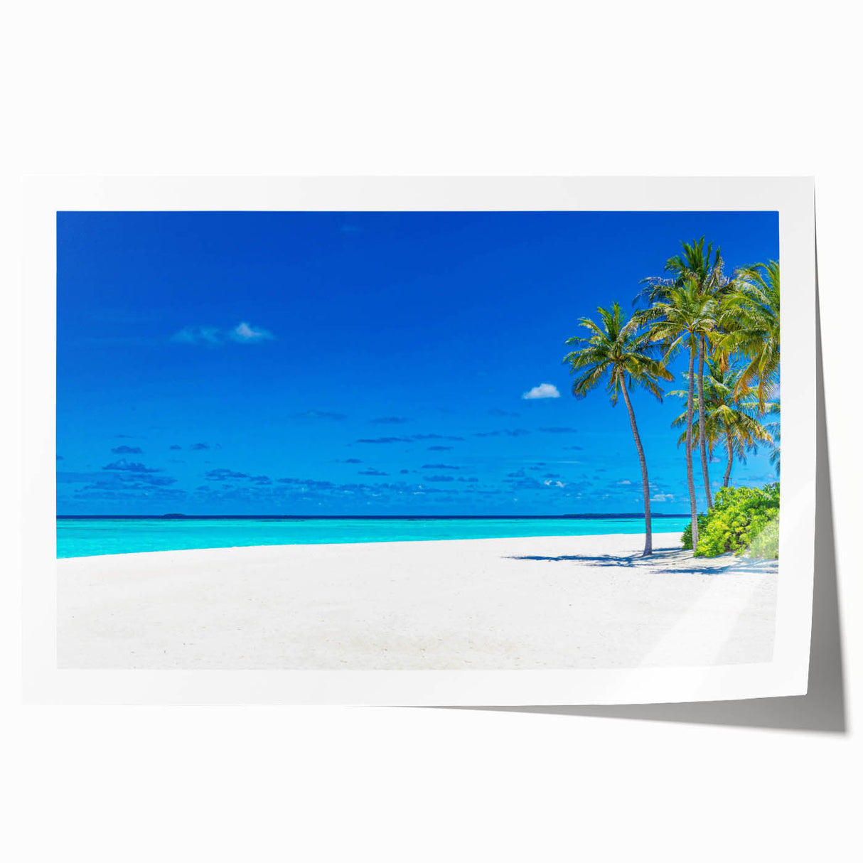 Rolled print of a serene seascape featuring gentle waves and a vibrant sunset, perfect for coastal decor. Packaged securely in a protective tube.