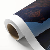 Rolled canvas showcasing a serene seascape design with vibrant blues and greens, elegantly packaged in a protective cardboard tube for wall art enthusiasts.