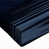 Close-up of a stretched canvas depicting vibrant seascape artwork, showcasing vivid blues and greens, perfect for enhancing home decor with coastal themes.