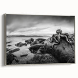 Framed canvas wall art showcasing a serene seascape design with calming blues and silver accents, perfect for enhancing modern interior decor.