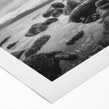 Rolled canvas artwork showcasing a vibrant seascape design with rich blues and greens, perfect for home decor, elegantly packaged in a protective tube.