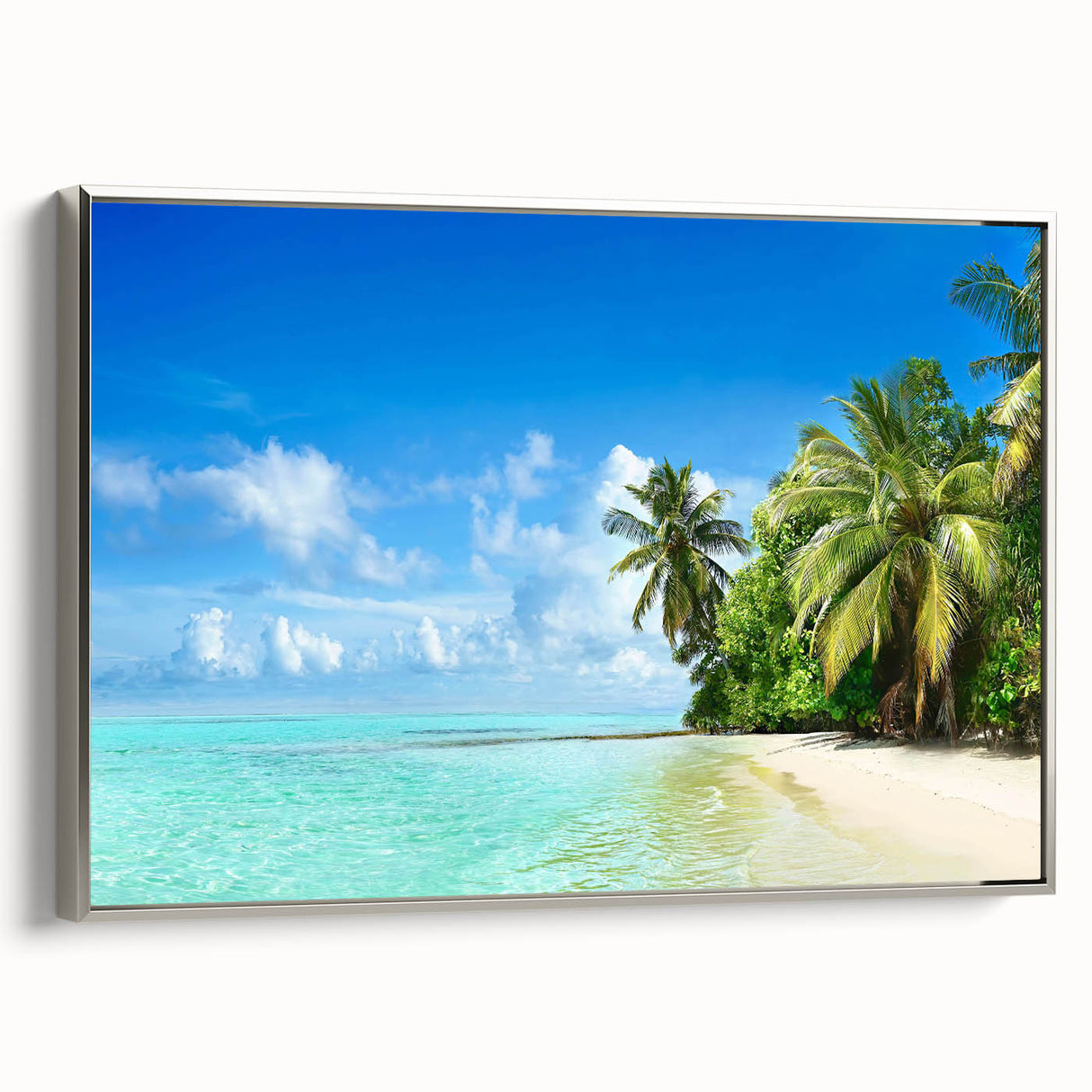Framed canvas artwork showcasing a serene seascape design with silver accents, highlighting tranquil waves and a calming blue palette, ideal for coastal decor.