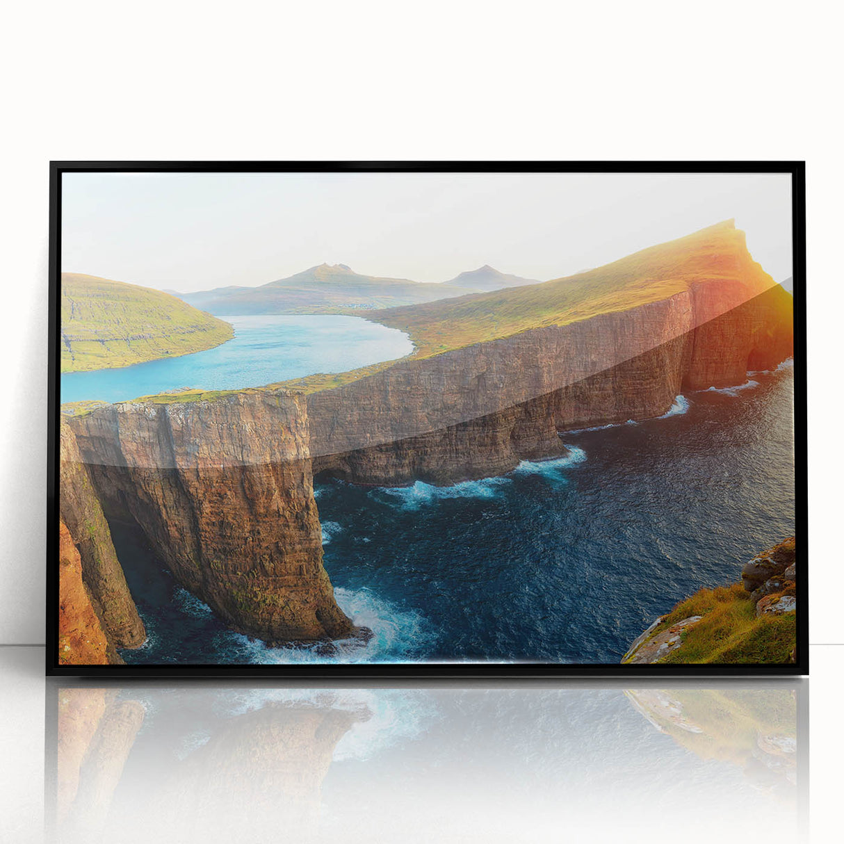 Framed acrylic wall art collection featuring a serene seascape design in black frame, showcasing calming blue ocean waves and a clear sky, perfect for modern home decor.