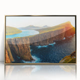 Framed acrylic wall art featuring a vibrant seascape design with gold accents, showcasing waves and a sunset, perfect for coastal home decor. Ideal for enhancing modern interiors.