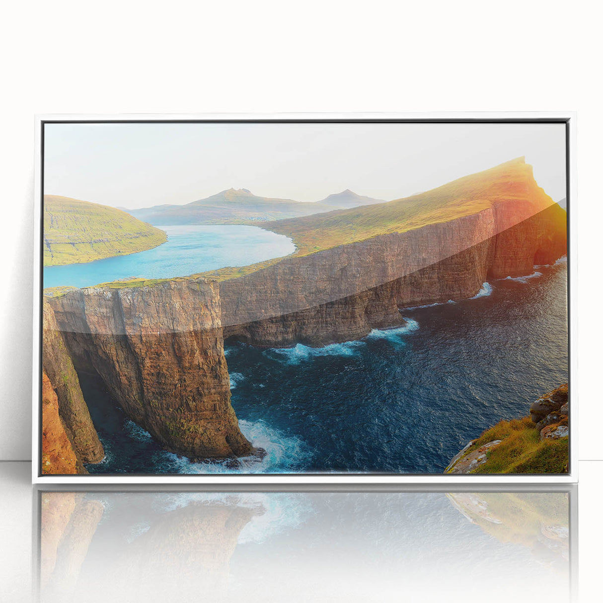 Framed acrylic wall art showcasing a serene seascape design featuring vibrant blue ocean waves and a soft sky, ideal for coastal home decor.