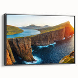 Framed canvas wall art from the Landscapes & Seascapes collection, showcasing a serene ocean view with vibrant colors, displayed in a sleek black frame. Ideal for enhancing modern decor.