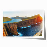 "Stunning landscape and seascape wall art collection featuring vibrant colors and intricate designs, rolled and ready for display in a protective cardboard tube."