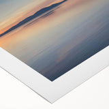 Rolled canvas showcasing a vibrant seascape design with rich blues and greens, elegantly displayed in a sturdy cardboard tube for secure shipping. Perfect for coastal-themed decor.