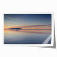 Rolled wall art print showcasing a serene seascape design with vibrant blues and soft pastels, ideal for coastal decor, presented in a protective cardboard tube.